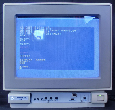 Commodore 1802D with white badge